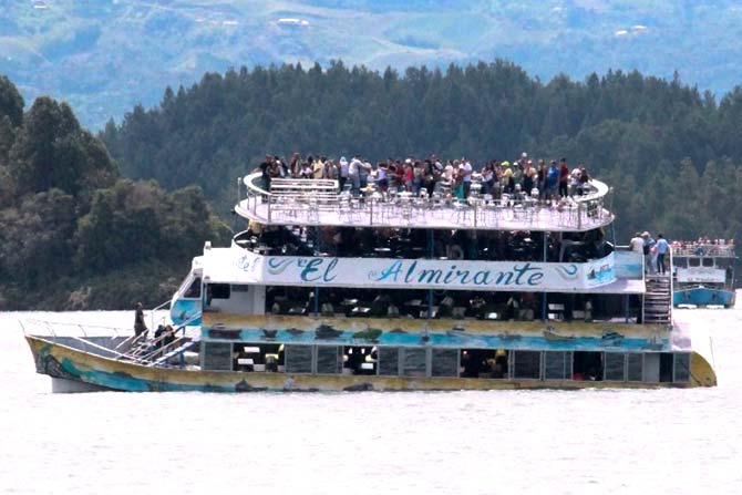 Passengers are seen onboard the tourist boat Almirante in the Reservoir of Penol in Guatape municipality in Antioquia. Pic/AFP
