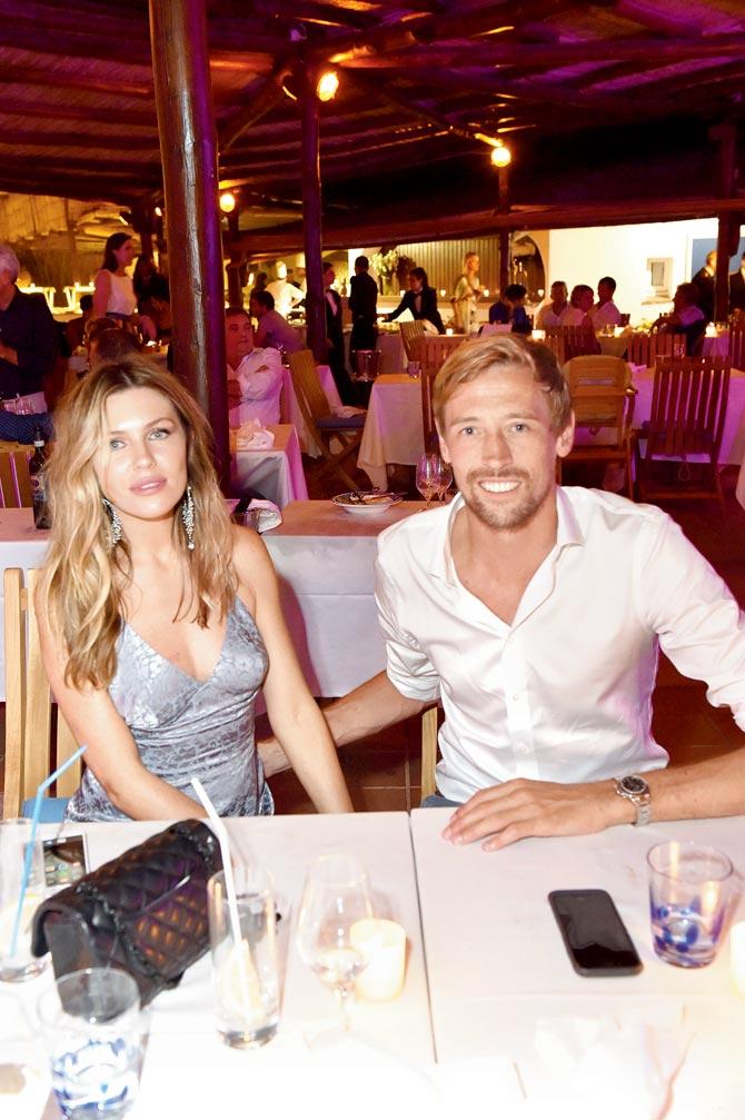 Former England footballer Peter Crouch with wife Abbey Clancy at the welcome dinner prior to The Costa Smeralda Invitational golf tournament at Pevero Golf Club in Italy on Friday. Pics/Getty Images