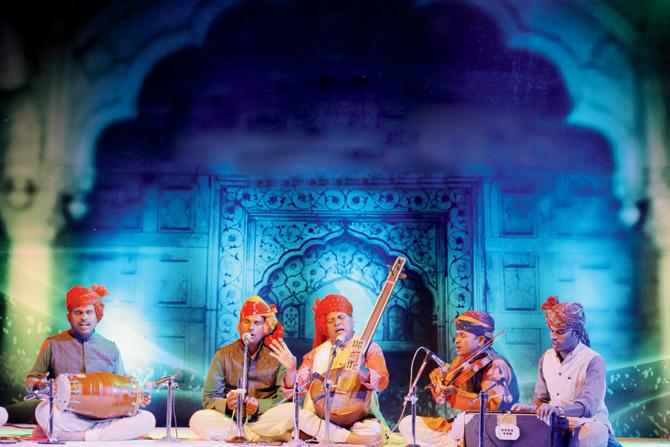 Prahlad Singh Tipaniya (centre), who hails from a region near Ujjain, is known for his Kabir renditions in Malwi folk style. He received the Padma Shri in 2011.