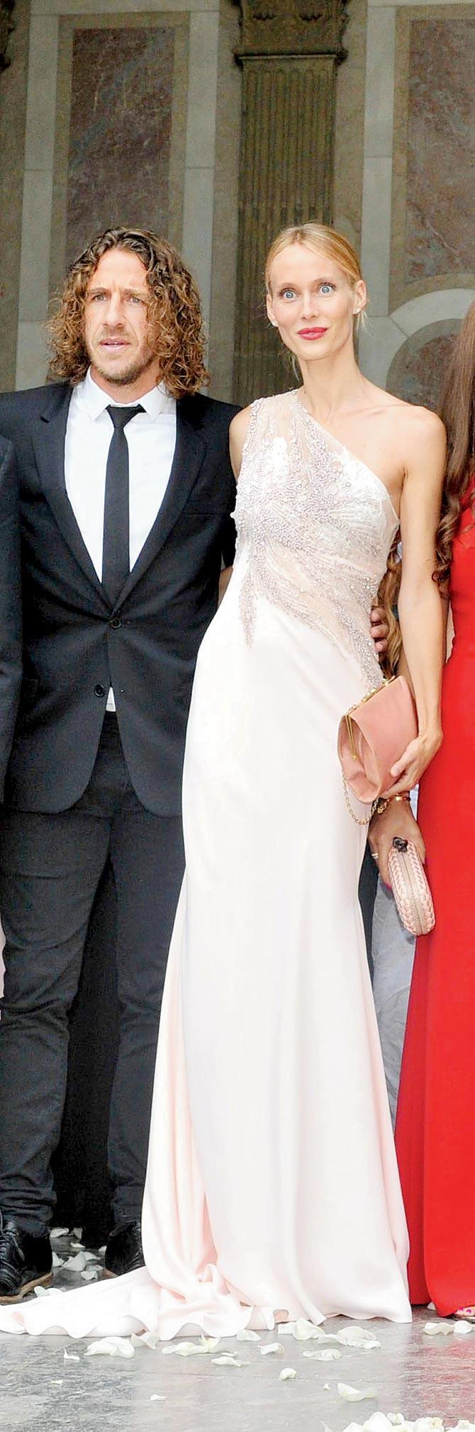 Carles Puyol with partner Vanessa Lorenzo