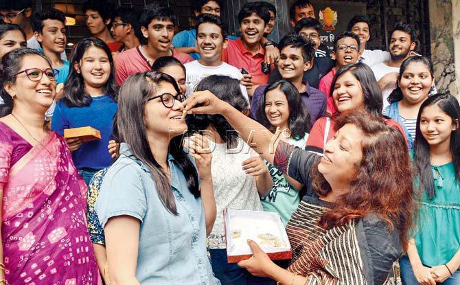 Students celebrating their success in the SSC examination at Balmohan Vidyamandir in Dadar on Tuesday. Pics/Sayed Sameer Abedi, Rajesh Gupta