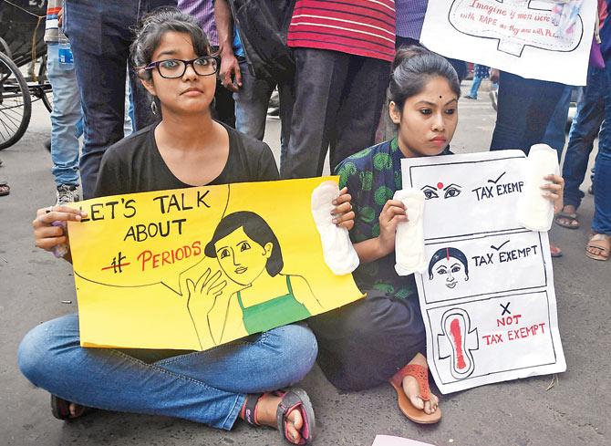 A recent protest against the 12% GST on sanitary pads. Pic/AFP