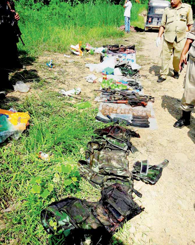 Arms and ammunition recovered from the terrorists. Pic/PTI