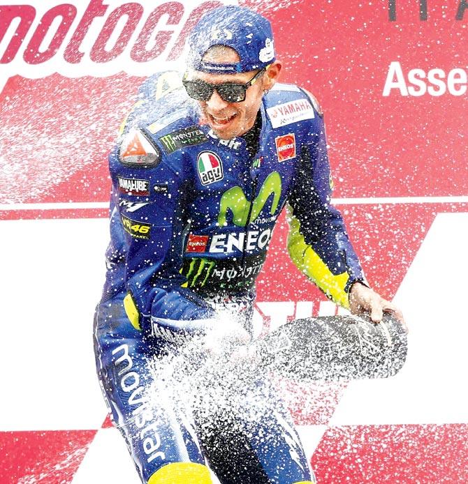 Valentino Rossi celebrates his Dutch GP win yesterday