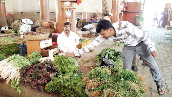 Vegetable vendor at the Pune APMC on Friday
