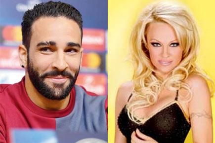 Are French footballer Adil Rami and Baywatch star Pamela Anderson dating?
