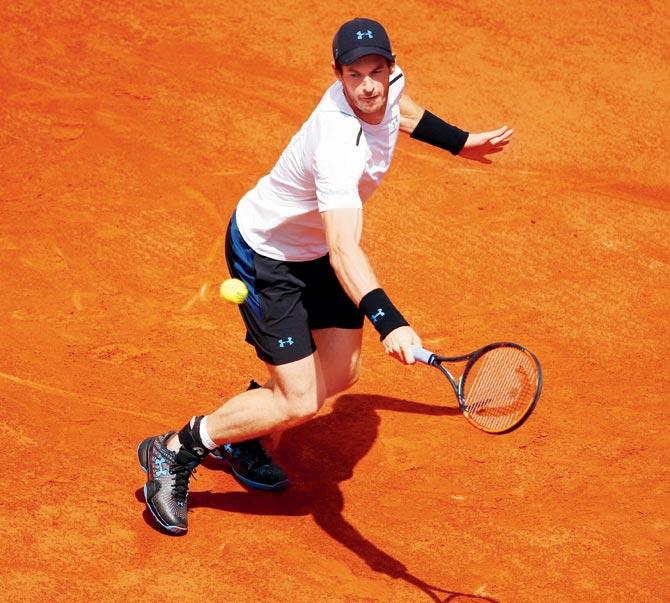 Andy Murray hits a backhand during the men’s singles fourth round match against Karen Khachanov at the French Open in Paris yesterday. Pic/Getty ImagesAndy Murray hits a backhand during the men’s singles fourth round match against Karen Khachanov at the French Open in Paris yesterday. Pic/Getty Images