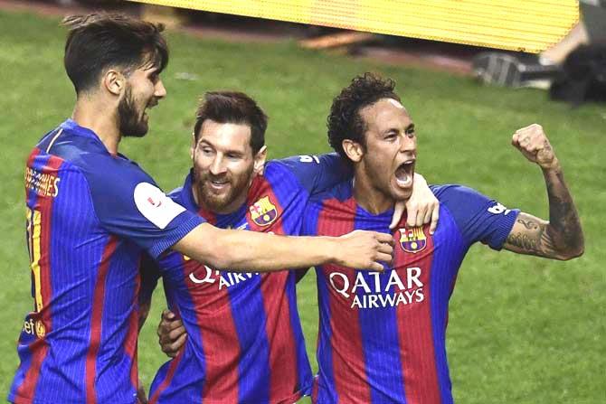 Andre Gomes, Lionel Messi, and Neymar. Pic/ AFP