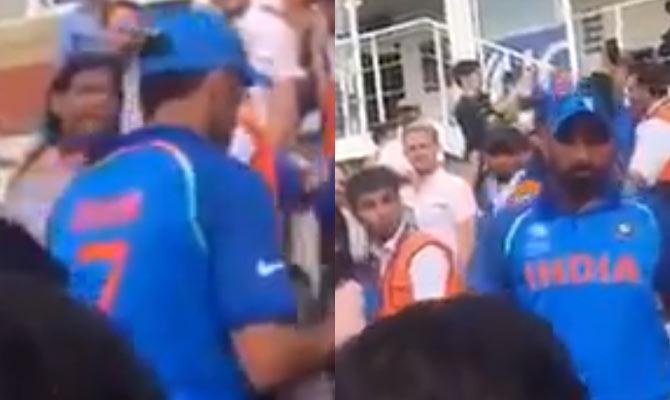 Grabs from the video showing a miffed Mohammed Shami approaching the tauting fan before being led away by MS Dhoni (L). Pic/Twitter