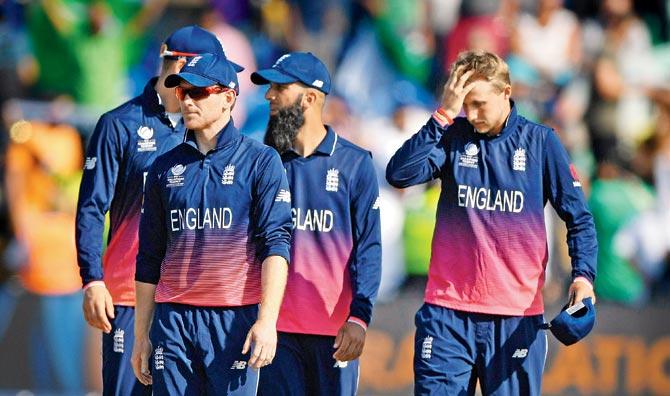 England players sport a dejected look after their eight-wicket defeat to Pakistan in the first semi-final on Wednesday. Pic/Getty Images