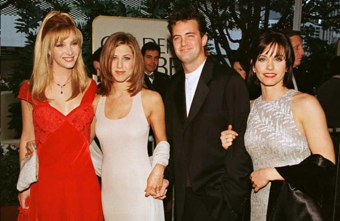 The cast of the hit US TV show "Friends" from L to R: Lisa Kudrow, Jennifer Aniston, Matthew Perry and Courtney Cox pose for photographers as they arrive for the 53rd Annual Golden Globe Awards 21 January in Beverly Hills. "Friends" is nominated for Best Comedy Televison Series.
