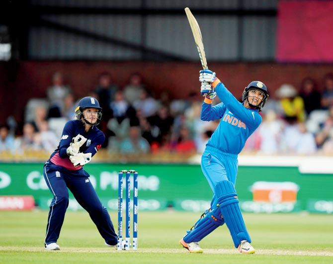 India opener Smriti Mandhana hits one over the fence en route her 72-ball 90 against England in Derby on Saturday. Pic/Getty Images