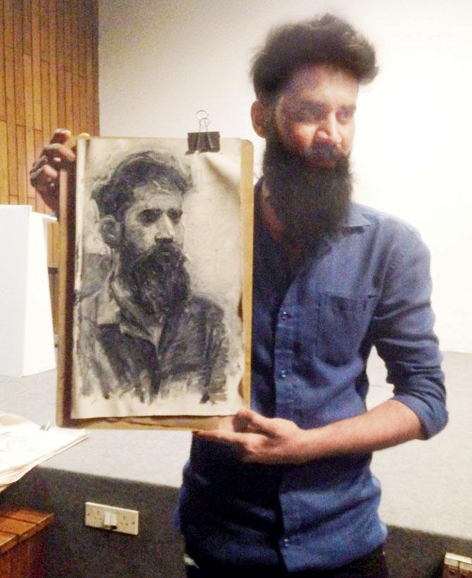 Manoj Maran with his sketch