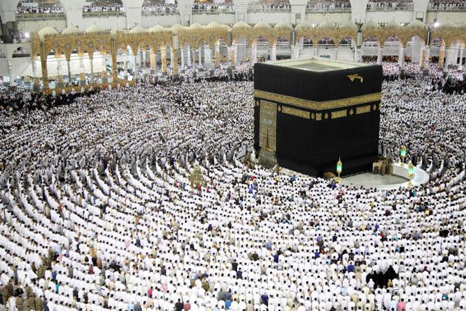 Muslim worshippers pray at the Kaaba, Islam