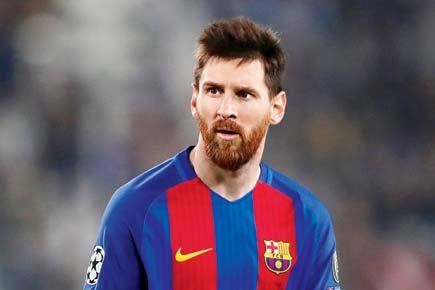 Lionel Messi pens three-year contract extension with Barcelona