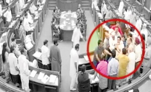 Kapil Mishra being manhandled in the House. He was targetted after he showed a banner