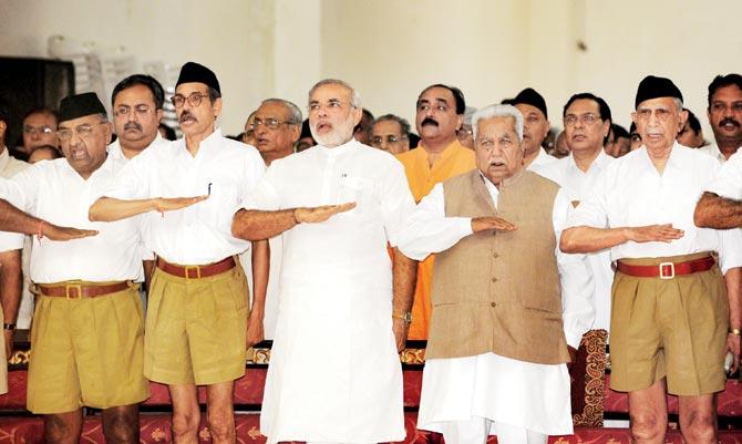 Narendra Modi at an Rashtriya Swayamsewak Sangh (RSS) gathering in 2009. Word is that his people are working on an initiative that tops the RSS wishlist — rechristening India as Hindustan. Pic/AFP