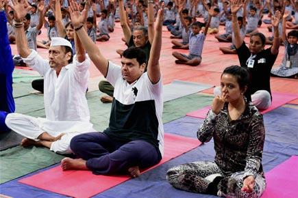 International Yoga Day: Mumbai celebrates yoga day on land, ships, submarines