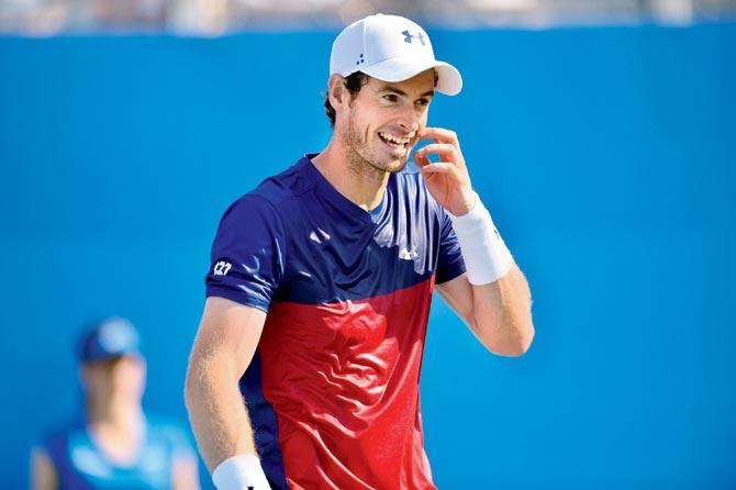 Britain’s Andy Murray sports a wry smile during his first-round loss vs Australia’s Jordan Thompson at Queen’s on Tuesday. Pic/AFP