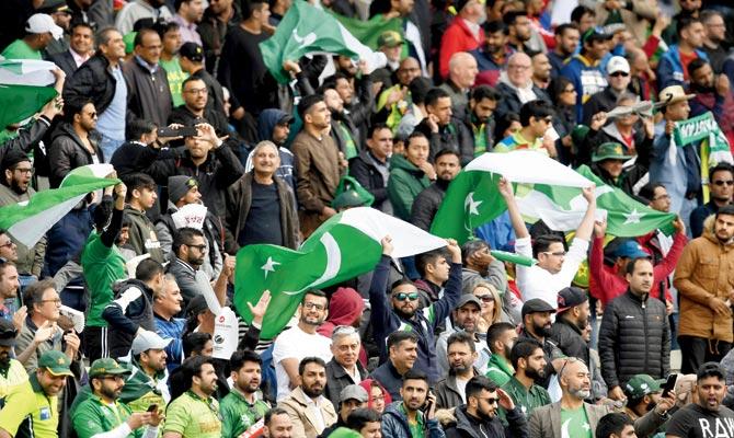 Pakistan supporters cheer their team during the match against  South Africa at Edgbaston in Birmingham on Wednesday. Pic/AFP