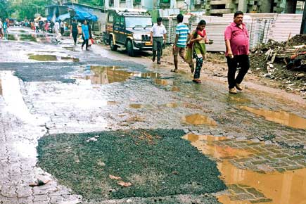 Mumbai rains: Are BMC engineers too busy to fix potholes?