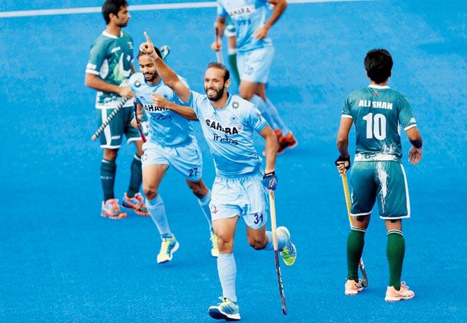 India’s Ramandeep Singh celebrates after scoring against Pakistan  in the 5th-8th place classification match in London on Saturday. Pic/PTI