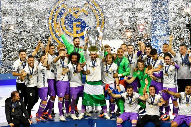 Sergio Ramos of Real Madrid lifts the trophy after Real Madrid won the UEFA Champions League final football match between Juventus and Real Madrid. Pic/AFP