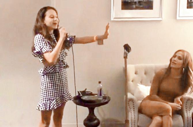Alex Rodriguez’s daughter Tashi sings to Jennifer Lopez in this screengrab taken from a video posted on social media by the retired baseball star 