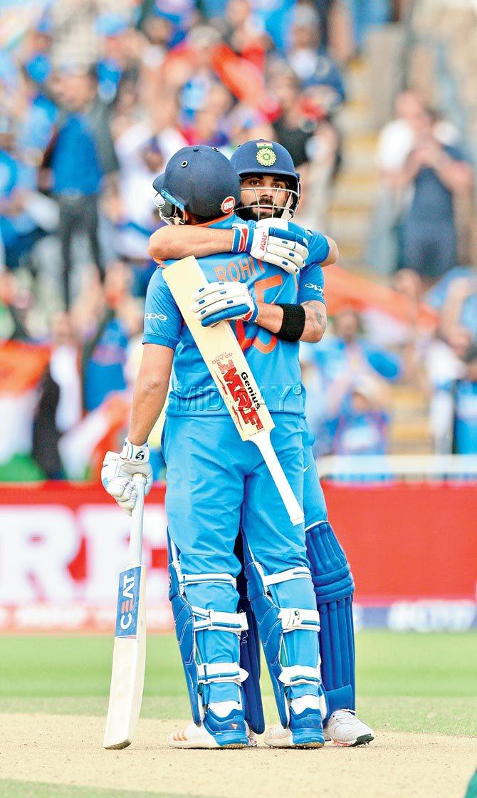 India’s Rohit Sharma celebrates his century with Virat Kohli during the Champions Trophy semi-final vs Bangladesh. Pic/Bipin Patel