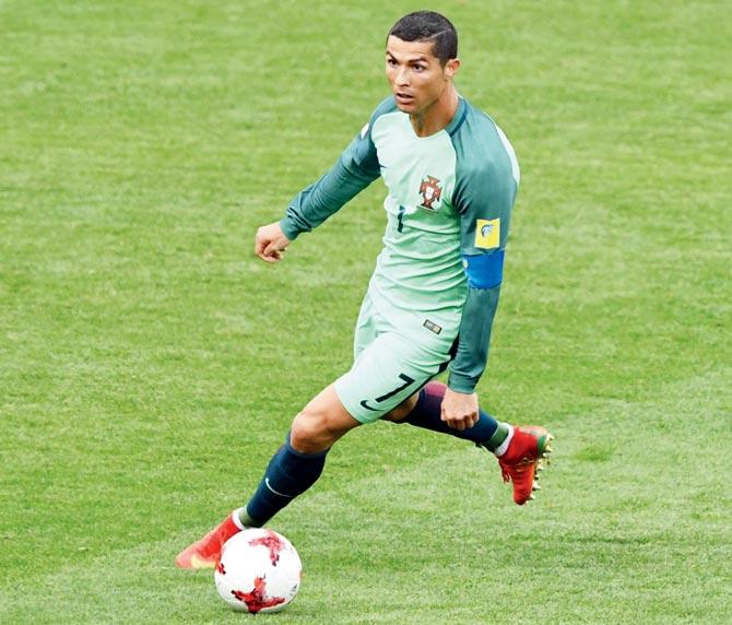 Portugal’s Cristiano Ronaldo dribbles during the Confed Cup match vs Russia on Wednesday. Pic/AFP
