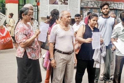 Mumbai: 71-year-old goes shirtless outside BMC ward office in protest