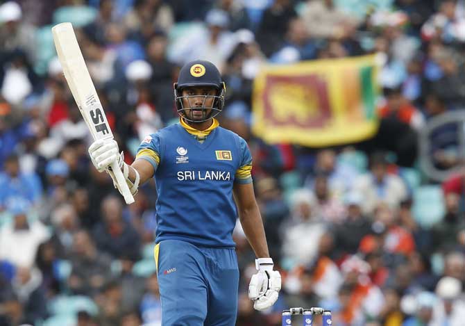 Sri Lanka’s Danushka Gunathilaka acknowledges the crowd after reaching 50 runs during the ICC Champions Trophy match between India and Sri Lanka at The Oval in London on June 8, 2017.