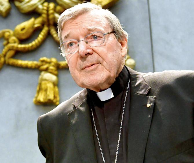 Australian Cardinal George Pell looks on as he makes a statement at the Holy See Press Office, Vatican city. Pic/AFP