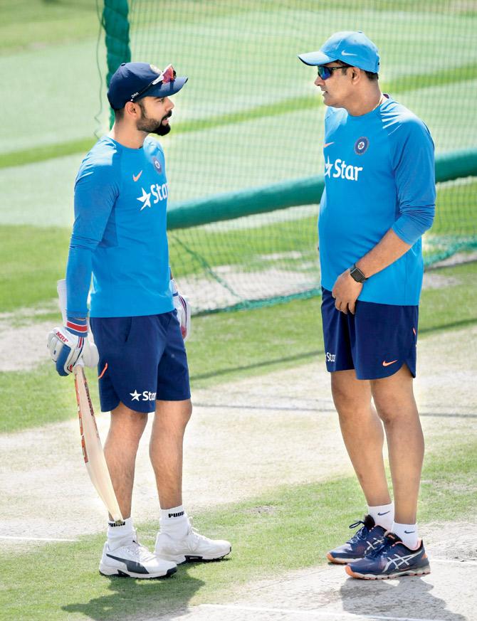 India captain Virat Kohli with then head coach Anil Kumble during the series vs Australia recently. Pic/AFP 