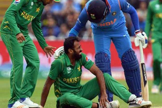 Pakistan bowler Wahab Riaz pulled up injured in his ninth over against India last Sunday. Pic/Twitter