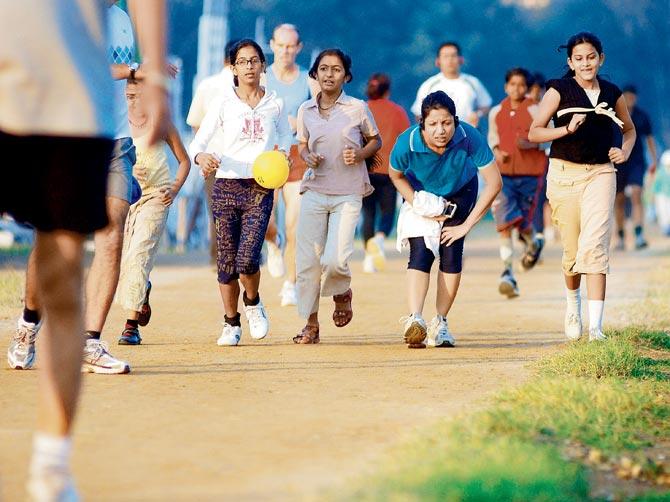 File photo of young women jogging at the Racecourse