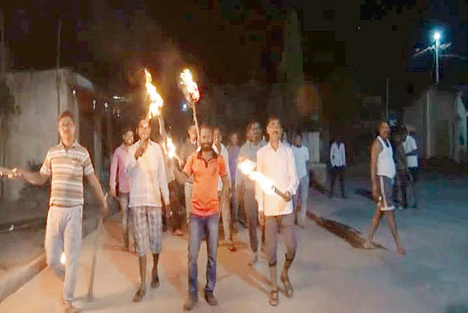 Villagers patrol various areas during night and day