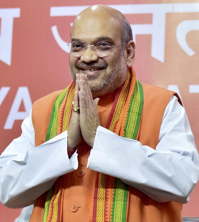 BJP president Amit Shah gestures as he arrives to address a press conference to celebrate party’s victory in the assembly elections, at the party head quarters in New Delhi on Saturday. Pic/PTI