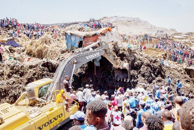 Rescue operations underway at the Koshe dump. PIC/AP