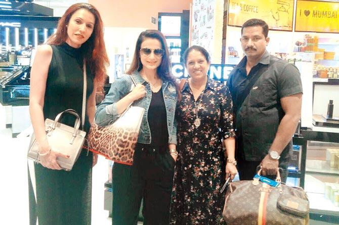 Ameesha Patel (second from left) with her team - make-up artiste Sapna Vaid (left), hairstylist Puja and bodyguard