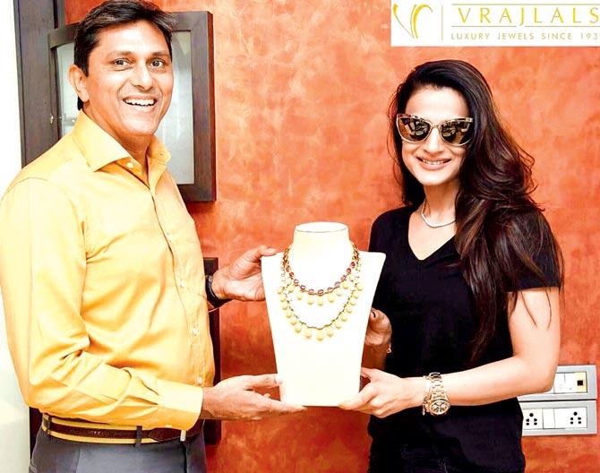 With the owner of a jewellery brand that she now represents