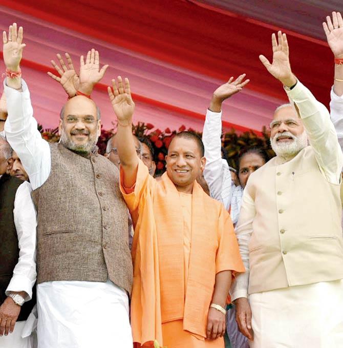BJPu00e2u0080u0088chief Amit Shah and PM Modi flank UPu00e2u0080u0088CM Yogi Adityanath in Lucknow. File pic