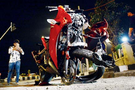 Four hurt in crash between luxury car, superbike at Mumbai