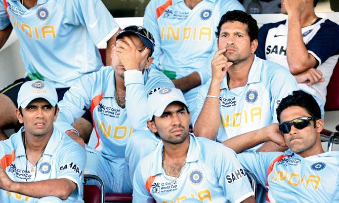 Skipper Rahul Dravid (extreme left), Virender Sehwag (hand on face), Sachin Tendulkar, Dinesh Karthik and Anil Kumble (right) watch the batting failure against Sri Lanka at Queen’s Park Oval in Port of Spain on March 23, 2007. India regrouped remarkably to win the next World Cup by beating the same opponents in the 2011 final. Pic/AFP