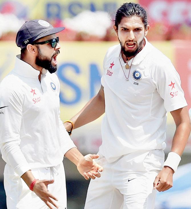 Ishant Sharma celebrates with Virat Kohli after the dismissal Australian batsman Matt Renshaw during 5th day of third Test match in Ranchi on Monday. Pic/PTI