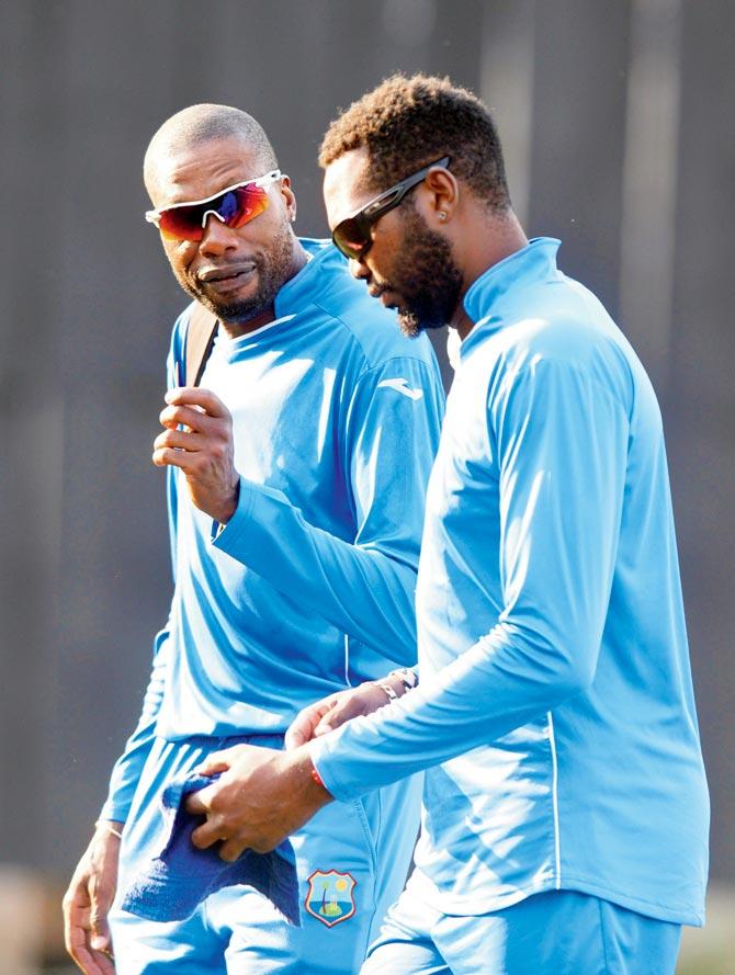 Curtly Ambrose with current West Indian cricketer Sulieman Benn