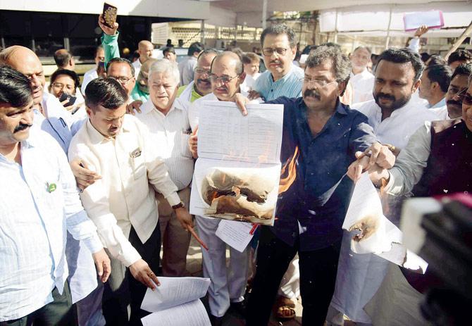 Opposition created a ruckus in the House last Saturday and burned copies of the state budget, demanding loan waiver for farmers