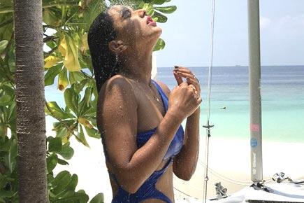 Nia Sharma shares sizzling swimwear photos, says 'let the temperatures soar'