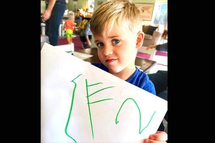 Reese Witherspoon cheers up son after he misspells his name