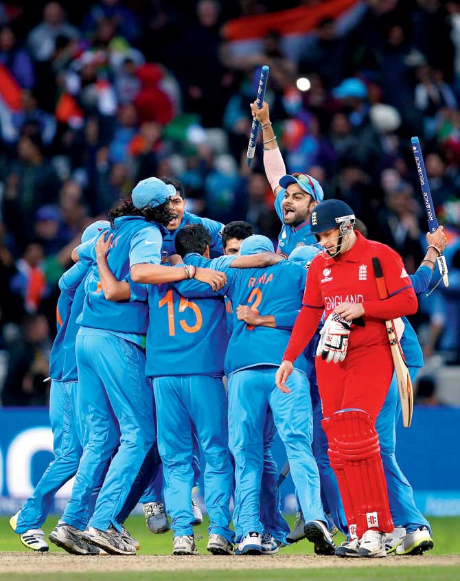 Team India celebrate after winning the Champions Trophy in 2013. Pic/AFP, Getty Images